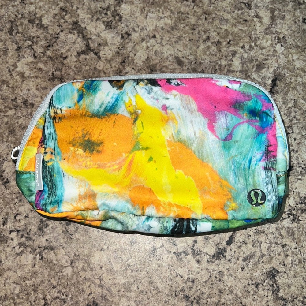 lululemon athletica abstract splash cosmetic pouch in yellow, pink, teal, orange
